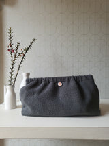 Clutch in tessuto goffrato