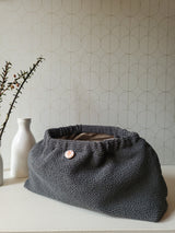 Clutch in tessuto goffrato