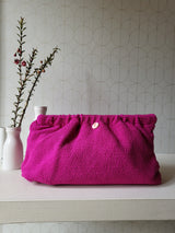 Clutch in tessuto goffrato