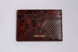 Snakeskin holder door