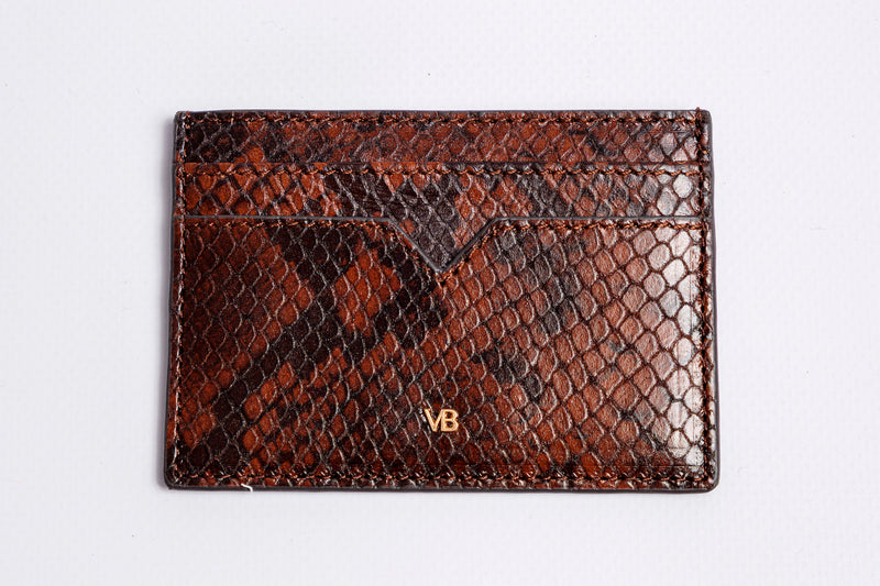 Snakeskin holder door