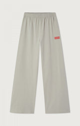 Pantalone jogging gamba ampia