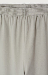 Pantalone jogging gamba ampia