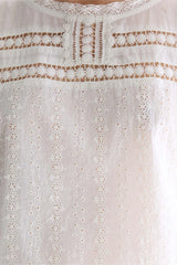 Blusa senza maniche ricamata bianca